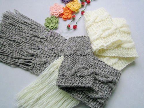 Hand-knitted pair grey and cream white wool scarf