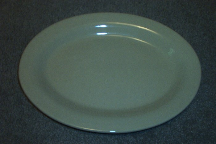 Gerald E Henn Workshops cream 13" oval platter