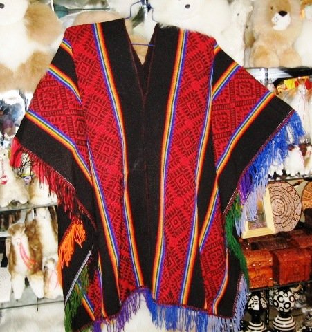 Typical peruvian red Poncho with stripes, Inca designs