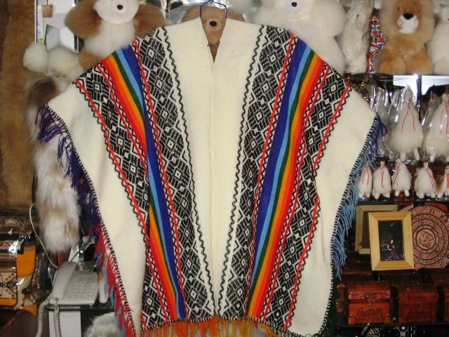 Typical peruvian white Poncho, folkloric designs