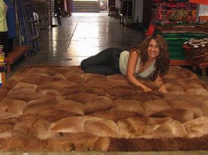 Brown alpaca fur carpet with rhombus designs, 90 x 60 cm