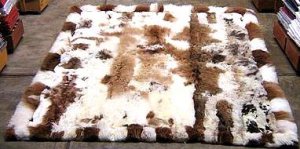 White and brown baby alpaca fur rug with very strong spots, 220 x 200 cm