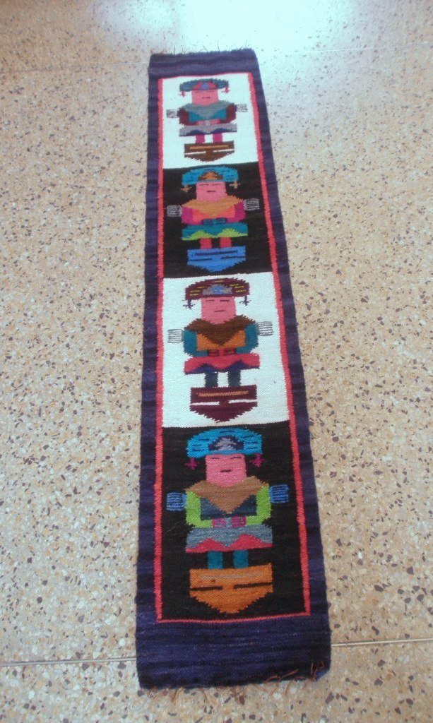 Peruvian hand weaved rug with Tumi Designs