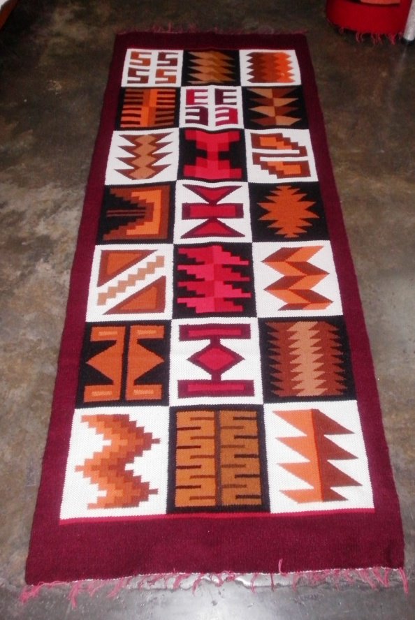 Peruvian hand weaved wool rug with native geometric designs
