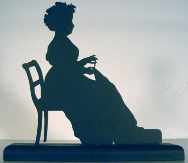 Woman Hand Sewing Decorative Wood Silhouette.