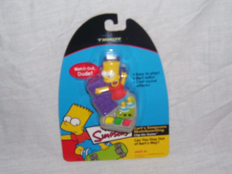 BART SIMPSON'S SKATEBOARDING CLIP ON GAME NEW! FROM 2002