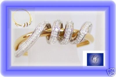 18k 2-tone gold right hand diamond designer ring. Size 7
