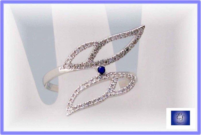 Modern Art. Diamond and sapphire wings. Right hand ring Sz 8.5