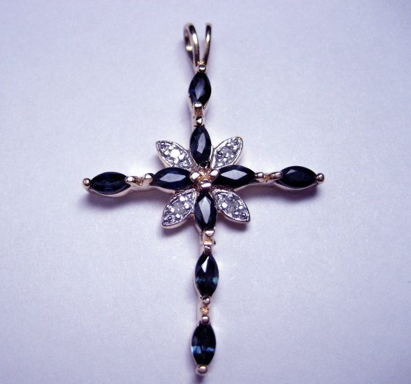 Blue marquise cut sapphire cross pendant. 1.25"