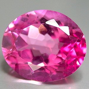 6 Ct. Flamingo Mystic Topaz 12 x 10mm Oval cut gem eye clean