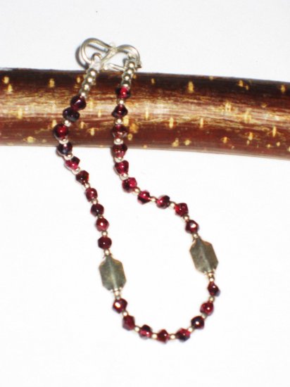 ST509 Garnet Bracelet in Sterling Silver