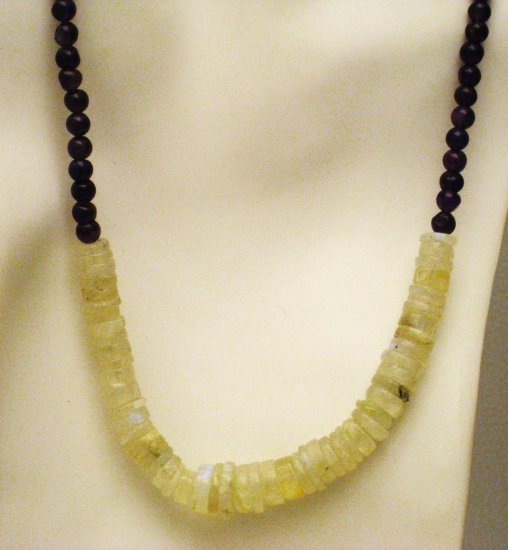 NK009 Moonstone Necklace with a Garnet Strand. Sterling Silver Clasp.