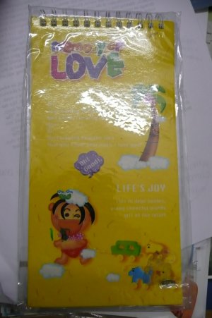 yellow spiral note pad