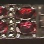 Sterling Silver Oval Cut Garnet and Marcasite Bracelet