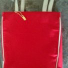 Red tote bag purse with cream colored handles