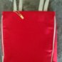 Red tote bag purse with cream colored handles