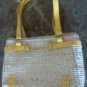 Straw purse with faux leather yellow straps
