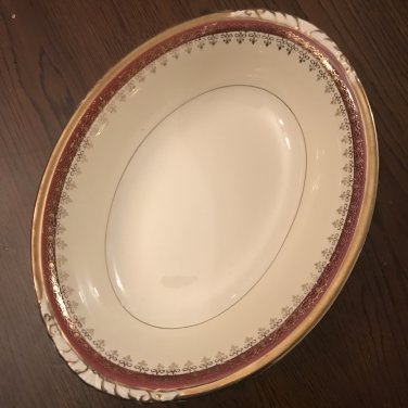 Homer Laughlin Eggshell Nautilus Maroon Gold 9 1/4" Lugged Oval Bowl Cardinal