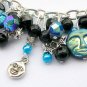 Czech moon face black aqua blue AB aurora borealis charm bracelet