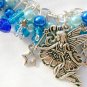 Fairy and dangling star charm blue aqua bead cha cha bracelet