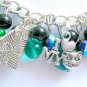 Cat and paw print teal green black AB glass bead charm bracelet