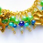 Cat paw print green blue gold cha cha charm bracelet