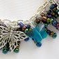 Butterfly charm AB aurora borealis rainbow aqua blue bead bracelet
