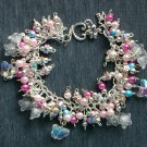 Flower and faceted crystal AB butterfly glass bead light pink bracelet Flower and faceted crystal AB butterfly glass bead light pink bracelet