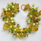 Cat paw print peridot light green gold charm bracelet
