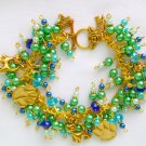 Cat paw print green blue gold cha cha charm bracelet