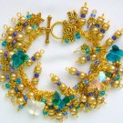 Crystal butterfly aqua blue bead gold flower cha cha bracelet Crystal butterfly aqua blue bead gold flower cha cha bracelet