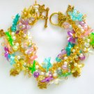 Flower four leaf clover pastel blue purple green charm bracelet Flower four leaf clover pastel blue purple green charm bracelet