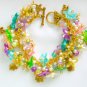 Flower four leaf clover pastel blue purple green charm bracelet