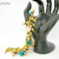 Crystal butterfly aqua blue bead gold flower cha cha bracelet