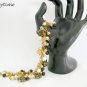 Czech black cat head bead gold paw print charm bracelet