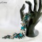 Butterfly charm AB aurora borealis rainbow aqua blue bead bracelet