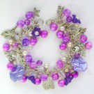 Cat paw print angel bell flower bright purple charm bracelet Cat paw print angel bell flower bright purple charm bracelet