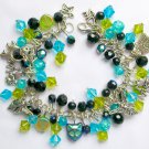 Cat aqua blue peridot green black iridescent AB charm bracelet Cat aqua blue peridot green black iridescent AB charm bracelet