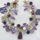 Cat Czech glass bead and paw print purple charm bracelet Cat Czech glass bead and paw print purple charm bracelet