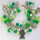 Hematite cat in the garden trumpet flower green charm bracelet Hematite cat in the garden trumpet flower green charm bracelet