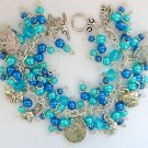 Dog lover aqua blue faux pearl bead charm cha cha bracelet Dog lover aqua blue faux pearl bead charm cha cha bracelet