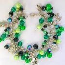 Cat and dragonfly bright green AB black bead charm bracelet Cat and dragonfly bright green AB black bead charm bracelet