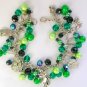 Cat and dragonfly bright green AB black bead charm bracelet