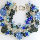 Paw print painted blue black animal lover charm bracelet