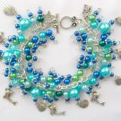Dolphin seashell ocean blue aqua pearl bead charm bracelet