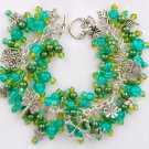 Garden butterfly dragonfly teal green crackle bead charm bracelet Garden butterfly dragonfly teal green crackle bead charm bracelet