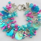 Four leaf clover aqua fuchsia pink iridescent charm bracelet