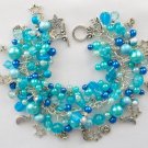 Moon and stars aqua blue bead cha cha charm bracelet