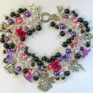 Fairy and bell flower purple pink black bead charm bracelet Fairy and bell flower purple pink black bead charm bracelet