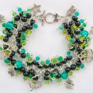 Four leaf clover lucky teal green black cha cha charm bracelet